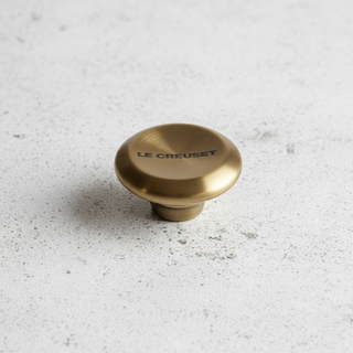 Pomolo Le Creuset oro scuro